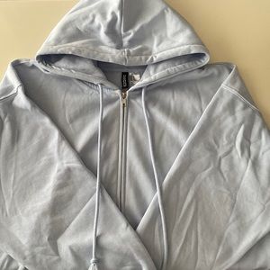 blue zip up hoodie